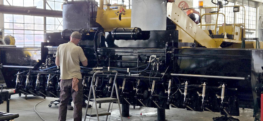 image of a rebuilt used chip spreader for sale